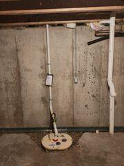 During: Arturo, one of our Foremen, and his crew replaced the sump pump and installed WaterGuard around the basement perimeter.