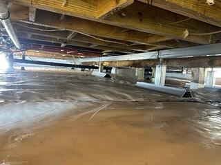 Clean, dry, and protected: this crawl space is now fully encapsulated with CleanSpace and SilverGlo.