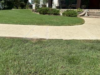 And here is the after! Notice the NexusPro now sealing each joint and crack along the walkway.