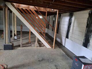 WaterGuard, TripleSafe, and CarbonArmor working together to keep this basement dry and stable.