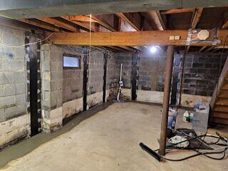 Wet Basement With Bowing Walls in Keyport, NJ