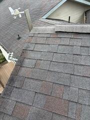 BEFORE: This roof did not have proper flashings, moss was beginning to grow in the valleys, and much of this old roof was improperly installed. It was time for a full roof replacement.