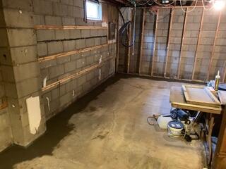 During: Our crew successfully installed the waterproofing products around the basement perimeter.
