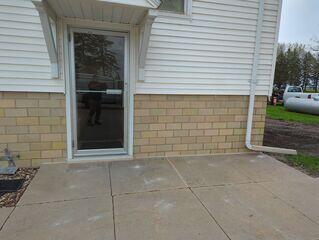During: The Design Specialist recommended lifting and leveling the sidewalk back into place.