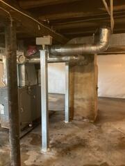In order to stabilize sagging floors caused by foundation settlement, our SmartJack System was installed beneath key load-bearing points, offering strong, adjustable support and restoring structural integrity to the home.