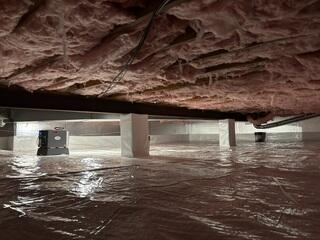 Finished crawl space with CleanSpace and SaniDry Sedona for year-round moisture control.