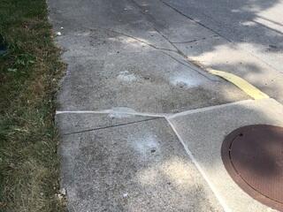 Spot 2 - After Photo:This sidewalk is now much safer to walk across.