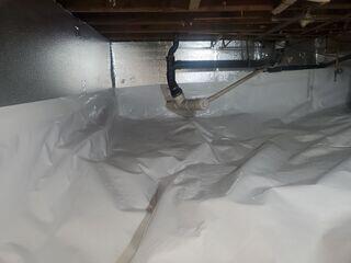 The team installed our CleanSpace Vapor Barrier to seal the crawl space from ground moisture, preventing mold growth, wood rot, and poor air quality throughout the home.