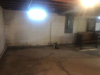 Before: The homeowner worried that the wet, cracked basement issues would worsen over time.