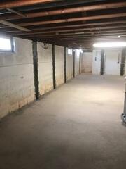 During: Our Design Specialist, Ryan, recommended installing several products throughout the basement.