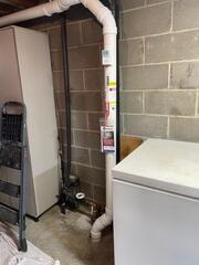 During: Dakota, our Foreman, secured the system on the exterior and interior of the home.