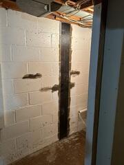 The CarbonArmor strip is placed on top and more epoxy is applied on top