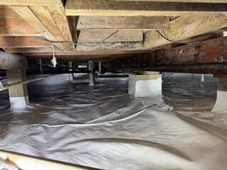 The crawl space after full encapsulation with CleanSpace and SilverGlo: bright, clean, and sealed against moisture.
