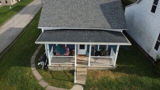 This is what the final product looked like. All new rubber roof, gutters, handrails, fascia, and trimming.