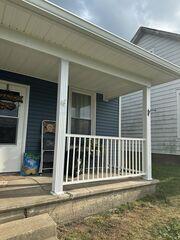 These new aluminum columns transformed the look of this front porch. The reworked framing also helped straighten out the soffit system, (which we reattached).