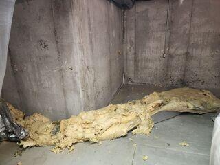 Water intrusion along the wall-floor joints in this unfinished basement left puddles and damp concrete after every rainfall.