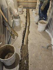 During: Our Foreman, Juan, and his crew secured the waterproofing products throughout the basement.