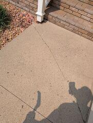 Moorhead, MN, Lowering Sidewalk Lifted with PolyLevel.