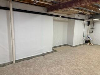 The basement is now fully waterproofed. Clean Space installed along the walls for a vapor barrier. Waterguard installed below with a Triple Safe Sump Pump for added protection.