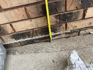 A close-up to how far the slabs have begun sinking