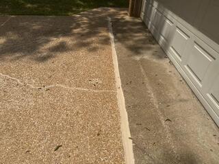 Some large separation between the driveway and garage that we were also able to seal.