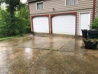 This photo shows the driveway before we leveled and repaired it.