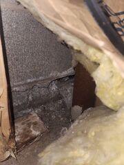 A close of the wall sheering from the bottom