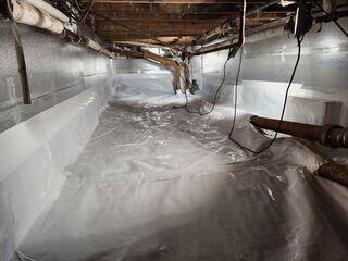 The crawl space was fully encapsulated with CleanSpace and SilverGlo, and a SaniDry Sedona was installed for long-term moisture control.