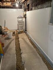 During: Our Foreman, Juan, and his crew secured and installed several waterproofing products throughout the basement.