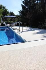 Sugar Lake Durastone Pool Deck & Outdoor Shower Upgrade in Eau Claire, WI