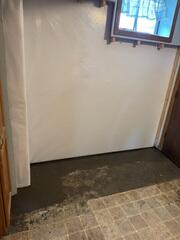 During: Our Foreman, Raul, and his crew worked together to install all the basement waterproofing products throughout the basement.