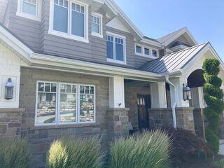 Sandy Home Secured with Gutter Shutter and Added Downspout for Maximum Prot...