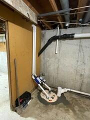 After: The homeowner was grateful to know their sump pump was properly running and radon risk was eliminated.