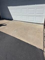 After: The crew lifting and leveling the concrete and sealing the joints