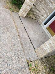 Before: The slab in front of the door had begun sinking