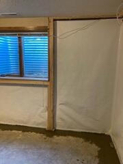Our crew attached CleanSpace on the walls and installed WaterGuard at the perimeter