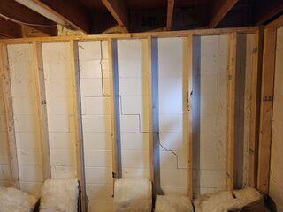 Before: Sean, one of our Design Specialists, confirmed the walls were suffering from damage and needed to be permanently stabilized.