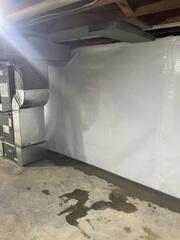 The crew also installed CleanSpace Wall Panels to act as a vapor barrier, blocking moisture from entering through the walls while also giving the basement a clean, finished appearance that improves overall air quality and comfort.