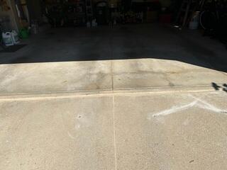 Our crew lifted and leveled the driveway and sealed the joint
