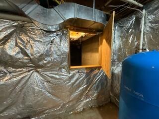 Entryway from the basement to the crawl space