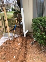 Downspout extension installed