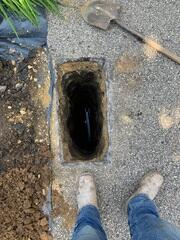During: Our Foreman, Luis, and his crew worked on securing the GeoLocks outside the home.