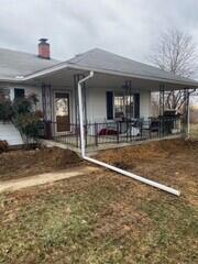 This was what the porch looked like after we lifted it. We also backfilled the piers with the soil we dug up to expose the footing.