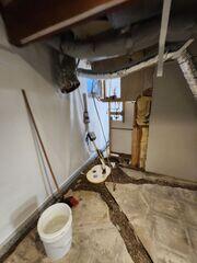 During: Our Foreman, Arturo, and his crew secured the waterproofing products throughout the basement.