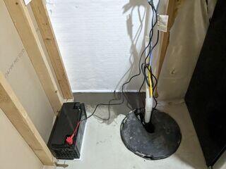 The crew replaced the pump with our Zoeller and installed our UltraSump