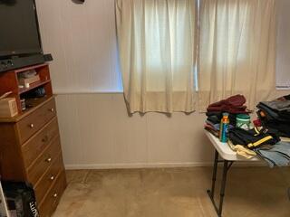 Water stains can be seen along the edges of the floors