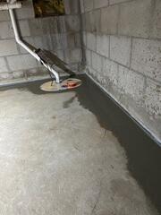 After our crew installed SuperSump+ and WaterGuard, the flooring was restored