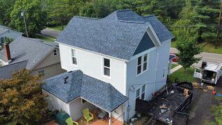 The Atlantic Blue colored shingles look great on the home.