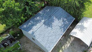 This photo shows the new roof on their shed.