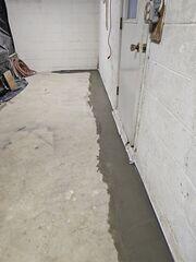 To stop water at its point of entry, we installed our WaterGuard Drainage System, a proven solution that captures seepage along the foundation and directs it to the sump pump before it ever reaches the basement floor.